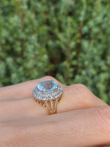 1764: Vintage: 9ct Gold Swiss Blue Topaz 16 Diamonds Diana Style Cluster Ring