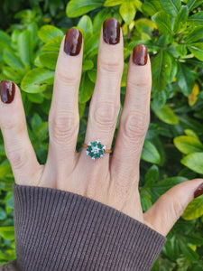 9083:Vintage: 18ct Gold 6 Emeralds 7 Diamonds Flower Head Ring- timeless classic. nice weight, sparkling