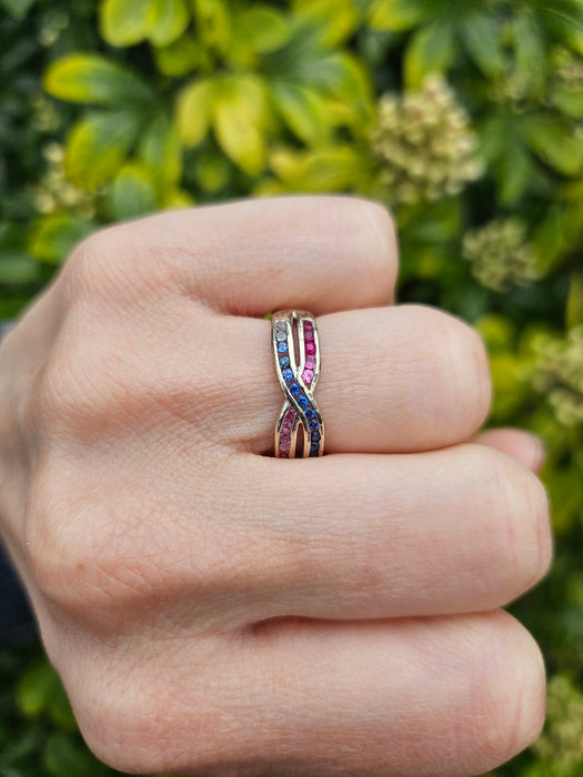 1429: Vintage: 9ct White Gold Rubies Sapphires Crossover Ring- crisp, colourful, eye candy