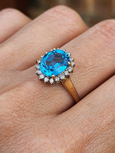 1650: Vintage: 9ct Gold Swiss Blue Topaz 18 Diamonds Cluster Ring- sparkling beauty