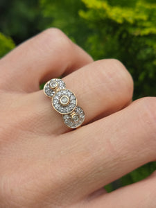 2303: Vintage; 9ct Gold 33 Diamonds Flower Head Trilogy Ring