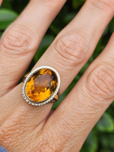 1957: Vintage; 14ct Gold Large (8ct) Oval Yellow Citrine Solitaire Ring- Old, lovely mature stone.