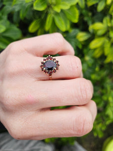 0771;Vintage: 9ct Gold 17 Rich Red Garnets Flower Head Ring- mature hues,