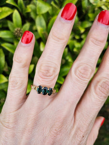 1322: Vintage: Rare 9ct Gold Green Garnet Trilogy Ring lovely cut and colours