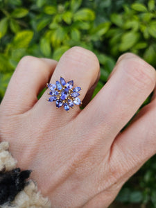 1065: Vintage: 9ct Gold Violet Blue Tanzanites Flower Cluster Ring
