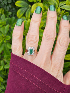 0144: Vintage: 9ct Gold Emerald Cut Emerald 14 Diamonds Square Set Ring