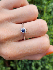 2107: Vintage: 18ct White Gold Cornflower Blue 10 Natural Diamonds Halo Ring- Crisp, clean eye candy-