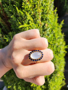 1725: Vintage:18ct Gold Large Moonstone (7ct) 18 Blue Sapphires Cocktail Ring- sensational