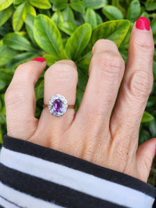 0096: Vintage:9ct Gold Oval Amethyst 12 Diamond Halo Ring-