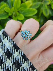 0896: Vintage: 9ct Gold 11 Swiss Blue Topaz Flower Head Ring- inspired design