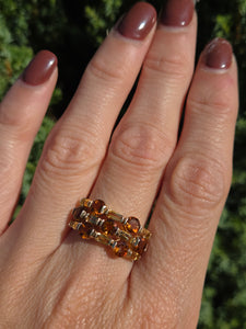 2157: Vintage; 9ct Gold Orange and Yellow Citrine Openwork Cocktail Ring