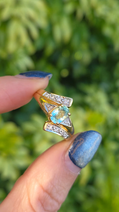 6416: 18ct Gold Blue Aquamarine  Diamonds Bypass Cocktail Ring