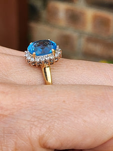 1650: Vintage: 9ct Gold Swiss Blue Topaz 18 Diamonds Cluster Ring- sparkling beauty