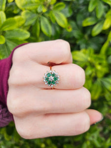 0131: Vintage: 18ct Gold Emeralds Diamonds Flower Head Ring - sparkling symmetry