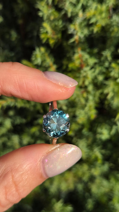 2191 Platinum Round Faceted Cut Blue Zircon Single Stone Ring