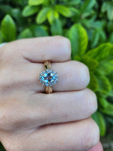 8235: Vintage: 9ct Gold Blue Aquamarine 14 Diamonds Halo Dress Ring