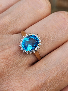 1650: Vintage: 9ct Gold Swiss Blue Topaz 18 Diamonds Cluster Ring- sparkling beauty