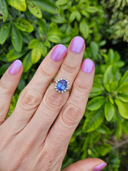 6500 Vintage: 18ct White Gold 2.06ct Tanzanite & Diamond Halo Cluster Ring