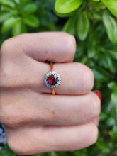 Load image into Gallery viewer, A8015: Vintage (1962) 18ct Gold Almandine Garnet 12 Round Cut Diamonds Daisy Ring- 62 years old and looking great
