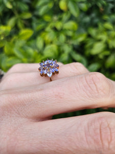 1065: Vintage: 9ct Gold Violet Blue Tanzanites Flower Cluster Ring