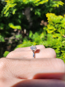 1702: Vintage: 14ct White Gold Brilliant Cut Diamond Solitaire; sparkling natural diamond
