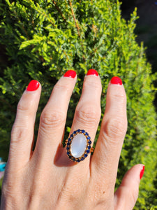 1725: Vintage:18ct Gold Large Moonstone (7ct) 18 Blue Sapphires Cocktail Ring- sensational