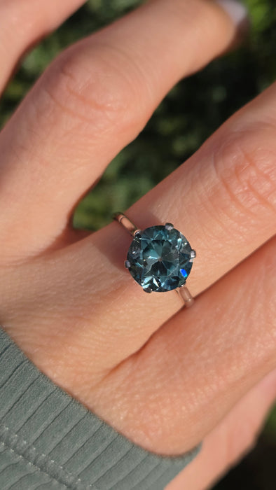 2191 Platinum Round Faceted Cut Blue Zircon Single Stone Ring