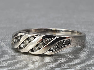 2887: Vintage: 9ct White Gold 12 brilliant cut diamonds Wave Ring- crisp and sparkling