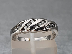 2887: Vintage: 9ct White Gold 12 brilliant cut diamonds Wave Ring- crisp and sparkling