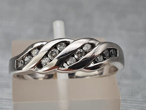 2887: Vintage: 9ct White Gold 12 brilliant cut diamonds Wave Ring- crisp and sparkling