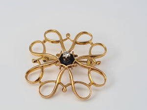 4105: Vintage: (1968) Brilliant round Cut Diamond Swirl Brooch- 55 years old lovely symmetry