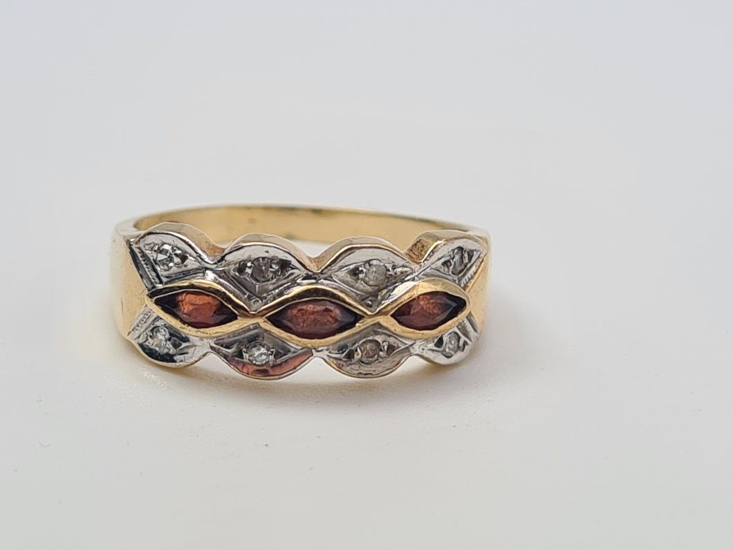 4658: Vintage; 9ct Gold Geometric Set Garnets Round Cut Diamonds Dress ring- lovely symmetry ,nice weight