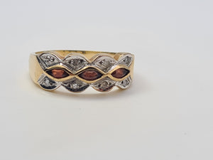 4658: Vintage; 9ct Gold Geometric Set Garnets Round Cut Diamonds Dress ring- lovely symmetry ,nice weight