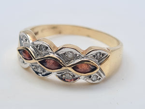 4658: Vintage; 9ct Gold Geometric Set Garnets Round Cut Diamonds Dress ring- lovely symmetry ,nice weight