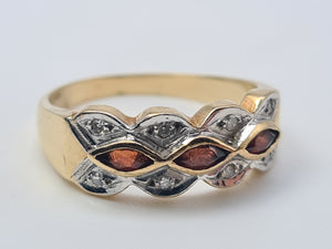 4658: Vintage; 9ct Gold Geometric Set Garnets Round Cut Diamonds Dress ring- lovely symmetry ,nice weight