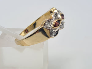 4658: Vintage; 9ct Gold Geometric Set Garnets Round Cut Diamonds Dress ring- lovely symmetry ,nice weight