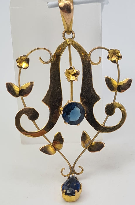 4823: Colgante de solapa de zafiros azules sintéticos de oro antiguo y antiguo de 9 quilates, simetría encantadora