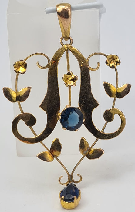 4823: Colgante de solapa de zafiros azules sintéticos de oro antiguo y antiguo de 9 quilates, simetría encantadora