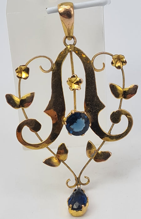4823: Colgante de solapa de zafiros azules sintéticos de oro antiguo y antiguo de 9 quilates, simetría encantadora